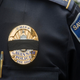 Police Chief Roy Minter wears a black band over his badge at a memorial ceremony on Monday, May 13, 2019, honoring slain Savannah police Sgt. Kelvin Ansari.